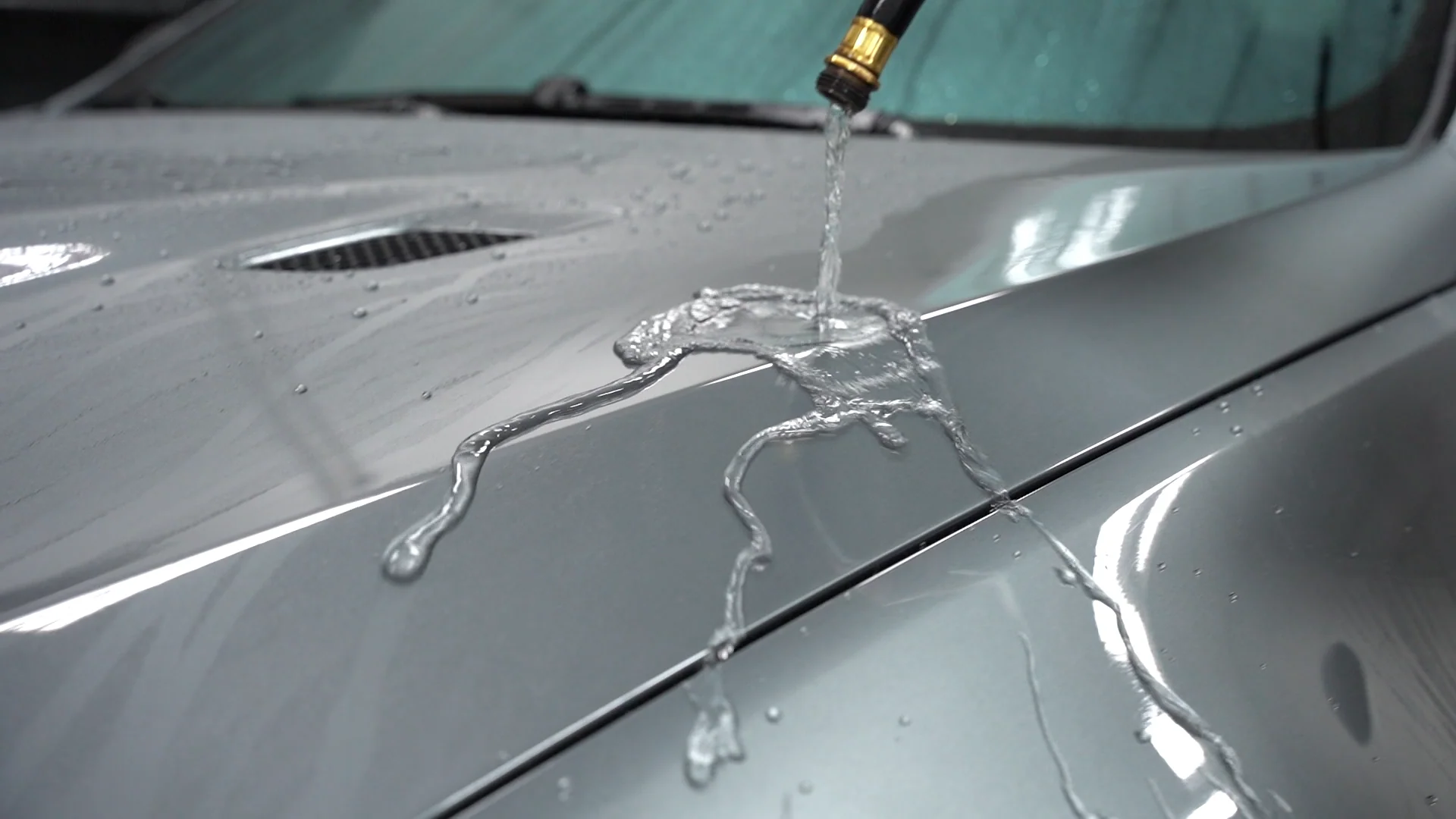 Water beading off a ceramic-coated hood